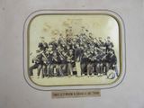 an old photo of a band of men posing for a picture