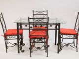 dining table with four chairs and a glass top