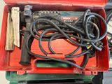 a red box with a bunch of tools inside of it
