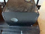 a small machine that is sitting on top of a pallet