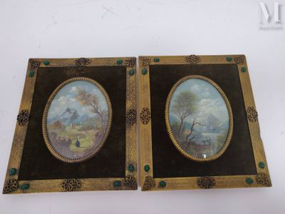 deux tableaux encadrés représentant un homme et une femme dans un paysage