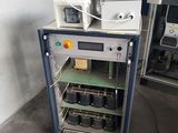 a machine that is sitting on top of a cart
