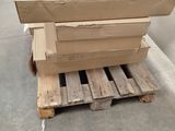 a stack of boxes sitting on a pallet in a warehouse