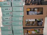 many boxes of food on a pallet in a warehouse