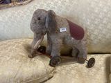an elephant that is sitting on top of a couch