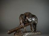 a statue of two elephants that are standing next to each other