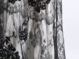 an image of a black and white dress on a mannequin mannequin mannequin mannequin mannequin mannequin mannequin mann