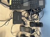 a lot of telephones that are sitting on a table