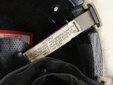 a close up of a helmet with a label on it