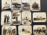 an old black and white photo of a group of men standing in front of an airplane