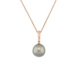 a black pearl pendant on a rose gold chain