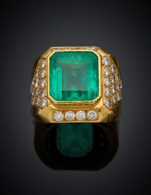 an emerald and diamond ring