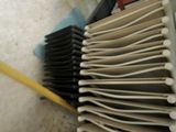 a lot of toothbrushes that are sitting on the floor