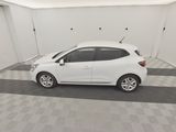 a picture of a white car parked in a garage