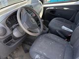 a car that has a steering wheel and a dashboard