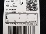 an image of a label on the back of a black shirt
