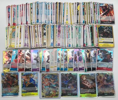 a collection of pokemon trading cards on a table