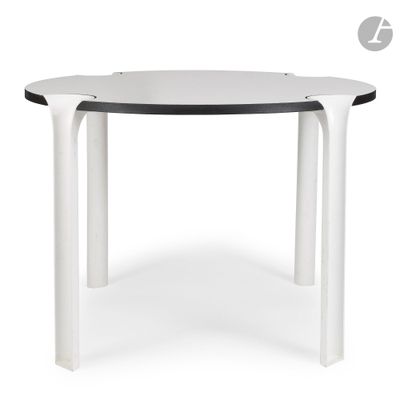 a close up of a white table with a black top