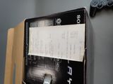 a box that has a receipt in it and a game controller