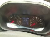 a close up of a car dashboard with a speedometer and gauges