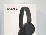 the box of the sony headphones is sitting on the table