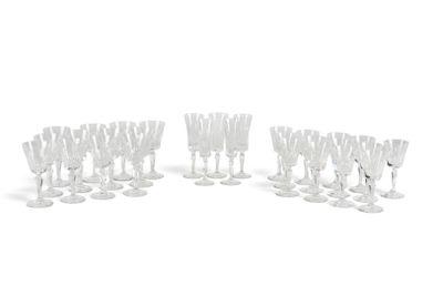 a lot of wine glasses that are sitting on the table