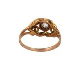 an image of a gold ring with a diamond in the center