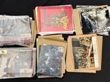 a lot of old photos on a black table