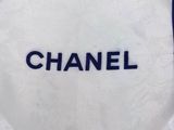chanel scarf with white and black logo on it