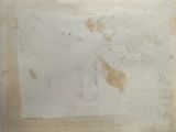 a picture of a piece of paper with some stains on it