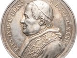 une image représentant une pièce d'argent sur laquelle figure le portrait d'un homme