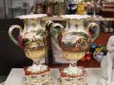 three vases that are sitting on a table in a room