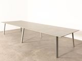 a long table that is sitting in the middle of a room