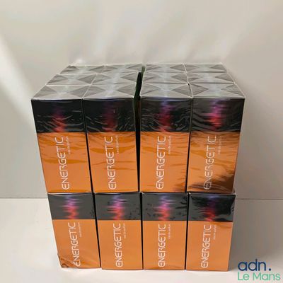 four boxes of electric hair products sitting on top of a table