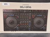 an image of a box with a dj controller inside of it