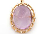 un pendentif en améthorite et diamants, signé Van Cleef