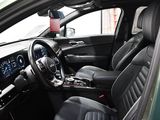 the interior of a car with a steering wheel, dashboard, and dash board