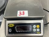 an image of a digital scale sitting on a table