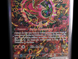 a close up of a pokemon card on a stand