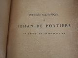 an old book that is open on a table