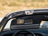 a close up of a car ' s interior with the door open