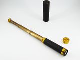 an image of a telescope with a black case next to it