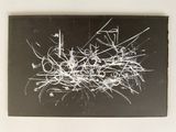 a black and white picture of a painting on a wall