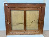 a picture of an old window with a rope on it