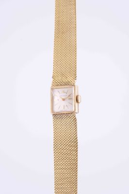an 18k yellow gold ladies ' s wrist watch