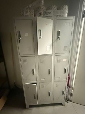 a stack of lockers in the corner of a room