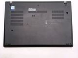 a laptop that is sitting on a white surface