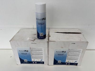 two boxes of air freshener sitting on top of a white counter