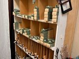 many boxes of soaps on the shelves in the bathroom