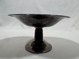 an image of a black glass bowl on a white background
